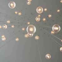Light bulbs hanging from the ceiling.